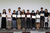 Peer mentors receive certificates of completion from Dr Yvonne Loong (right 1)